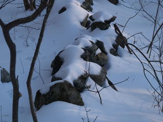 Snow convered stone wall