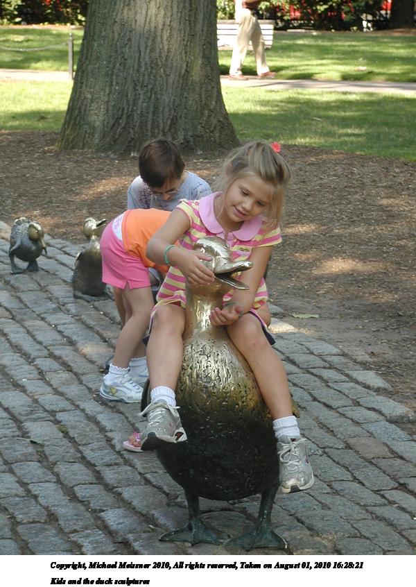 Kids and the duck sculptures #3