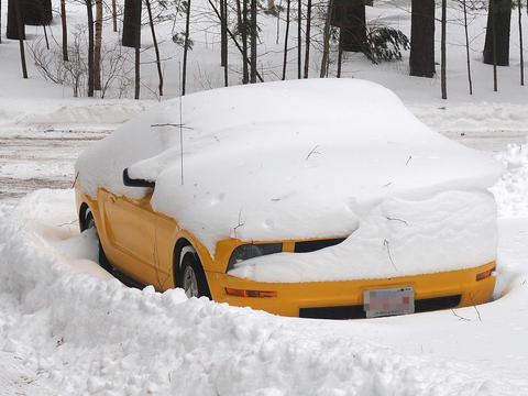 Yellow mustang in snow #2