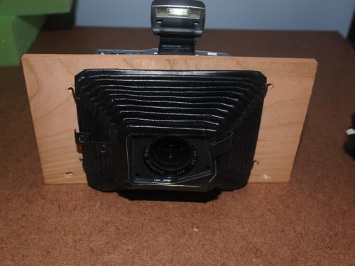 Front of small steampunk camera