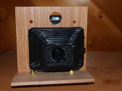 Olympus E-PM2 on small steampunk camera base #2