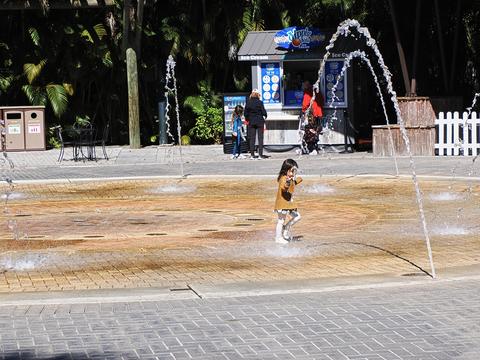 Kid in the fountain