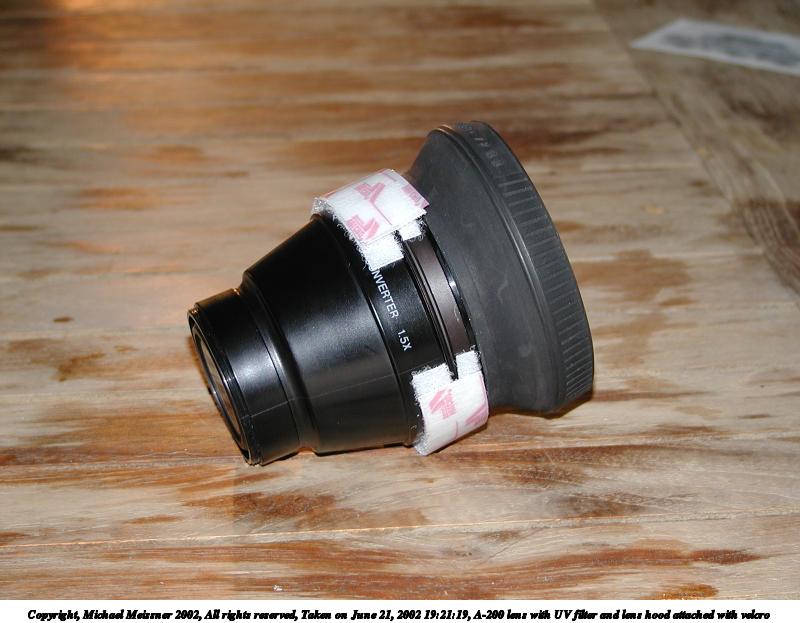 A-200 lens with UV filter and lens hood attached with velcro