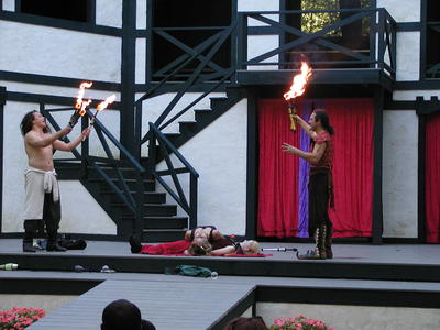 Juggling fire over audience members