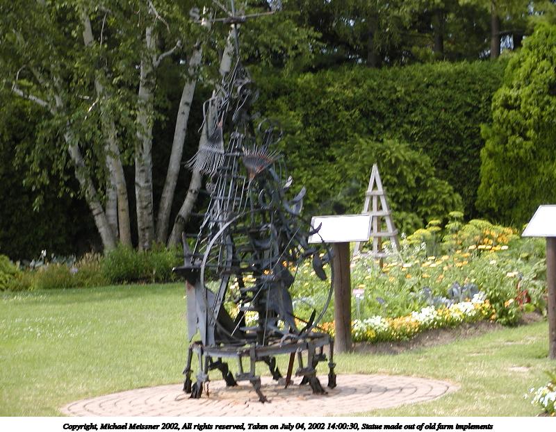 Statue made out of old farm implements