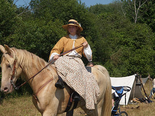 Riding side saddle