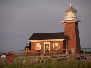 Lighthouse & surfer memorial