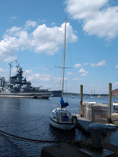 Sailboat and battleship