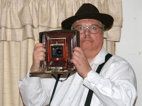 Picture of me holding the Premo/E-P2 frankencamera