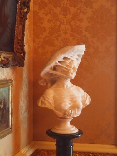 Bust with a hat