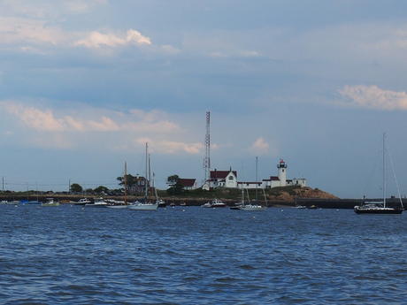 Lighthouse and sailboats