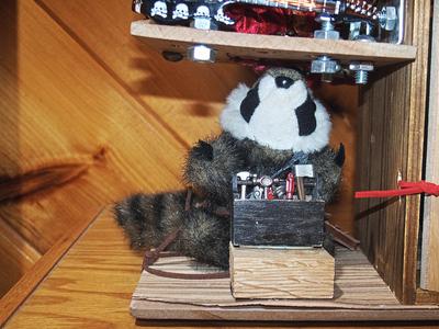 Racky the racoon with tools