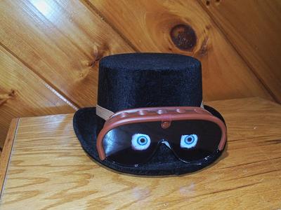Top hat with a goggle with electronic eyes