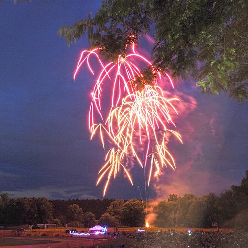 Groton fireworks, partially blocked by a tree #2