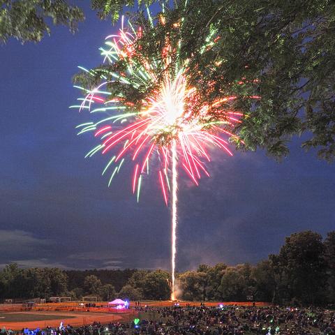 Groton fireworks, partially blocked by a tree #3