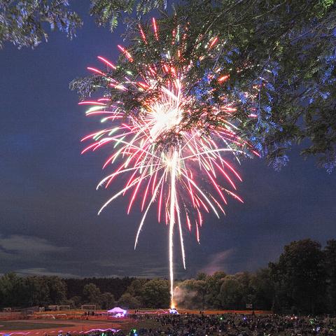 Groton fireworks, partially blocked by a tree #4