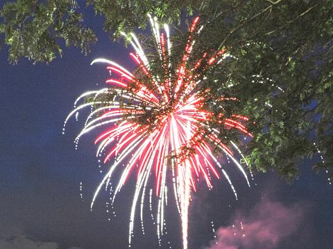 Groton fireworks, partially blocked by a tree #5